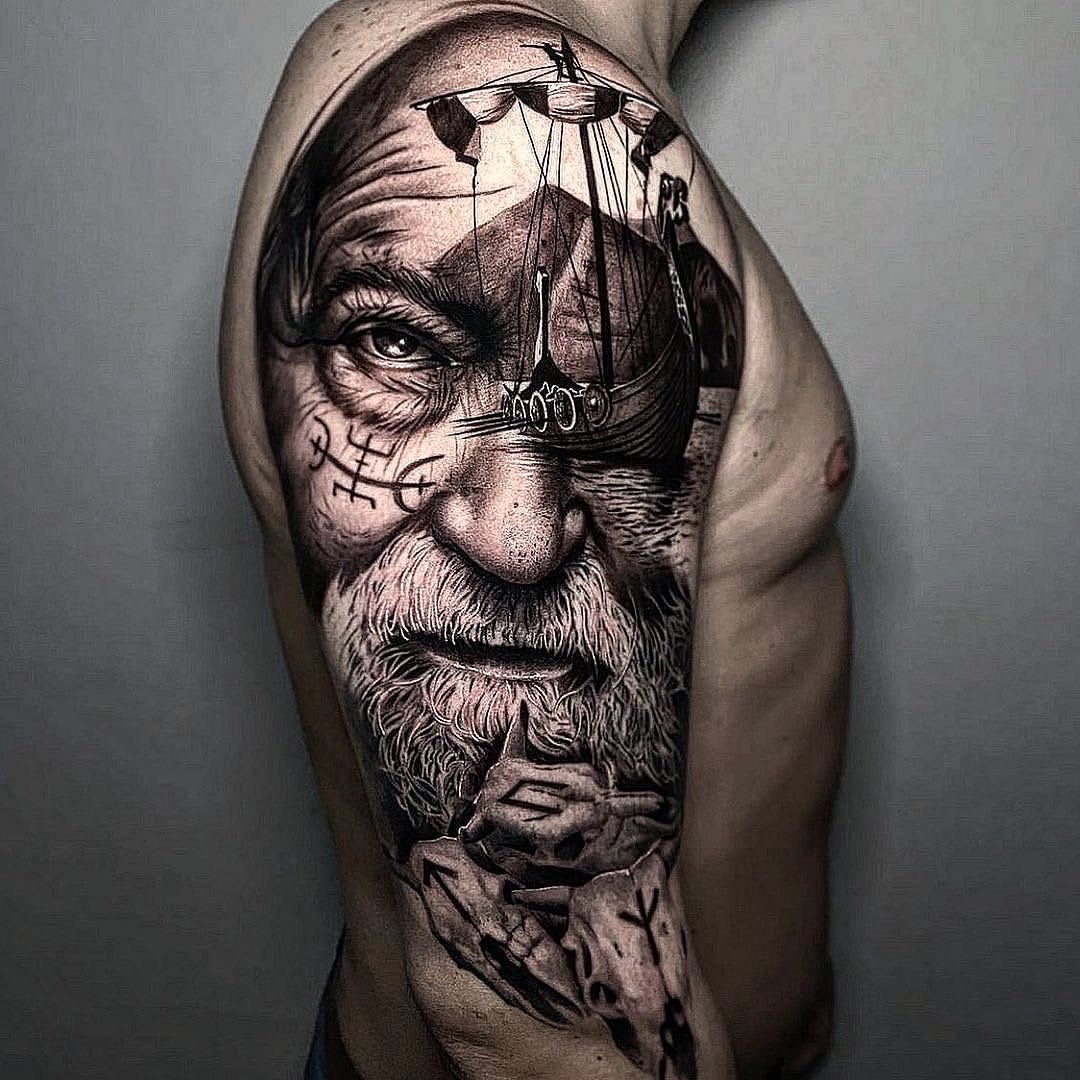 a man with a ship cover-up tattoo on his arm, kreisfreie stadt augsburg, germany