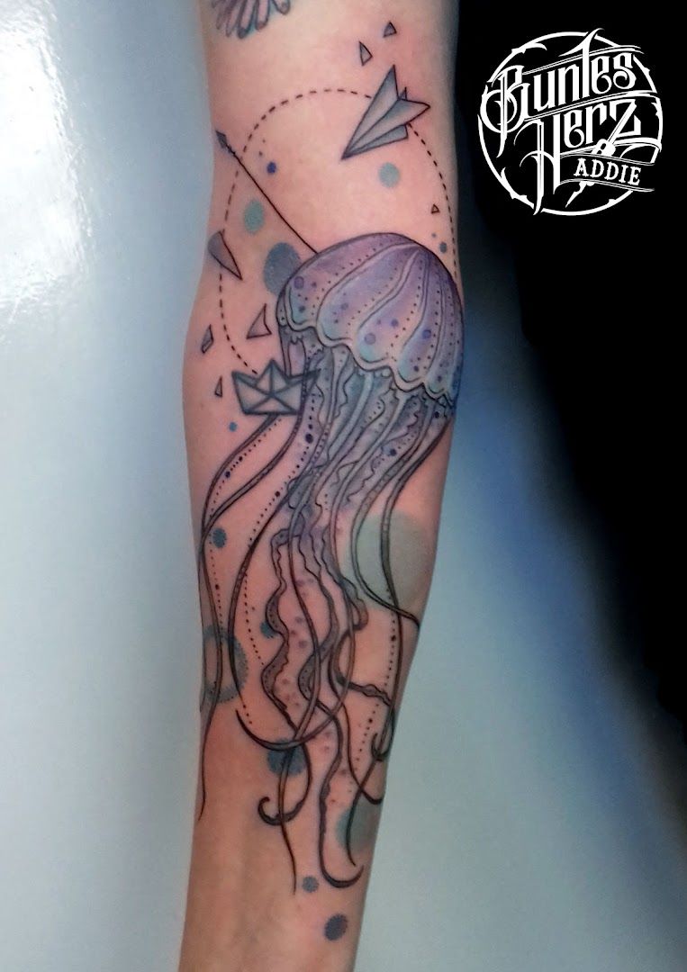 a narben tattoo of a jellyfish with a starfish on it, hamburg, germany