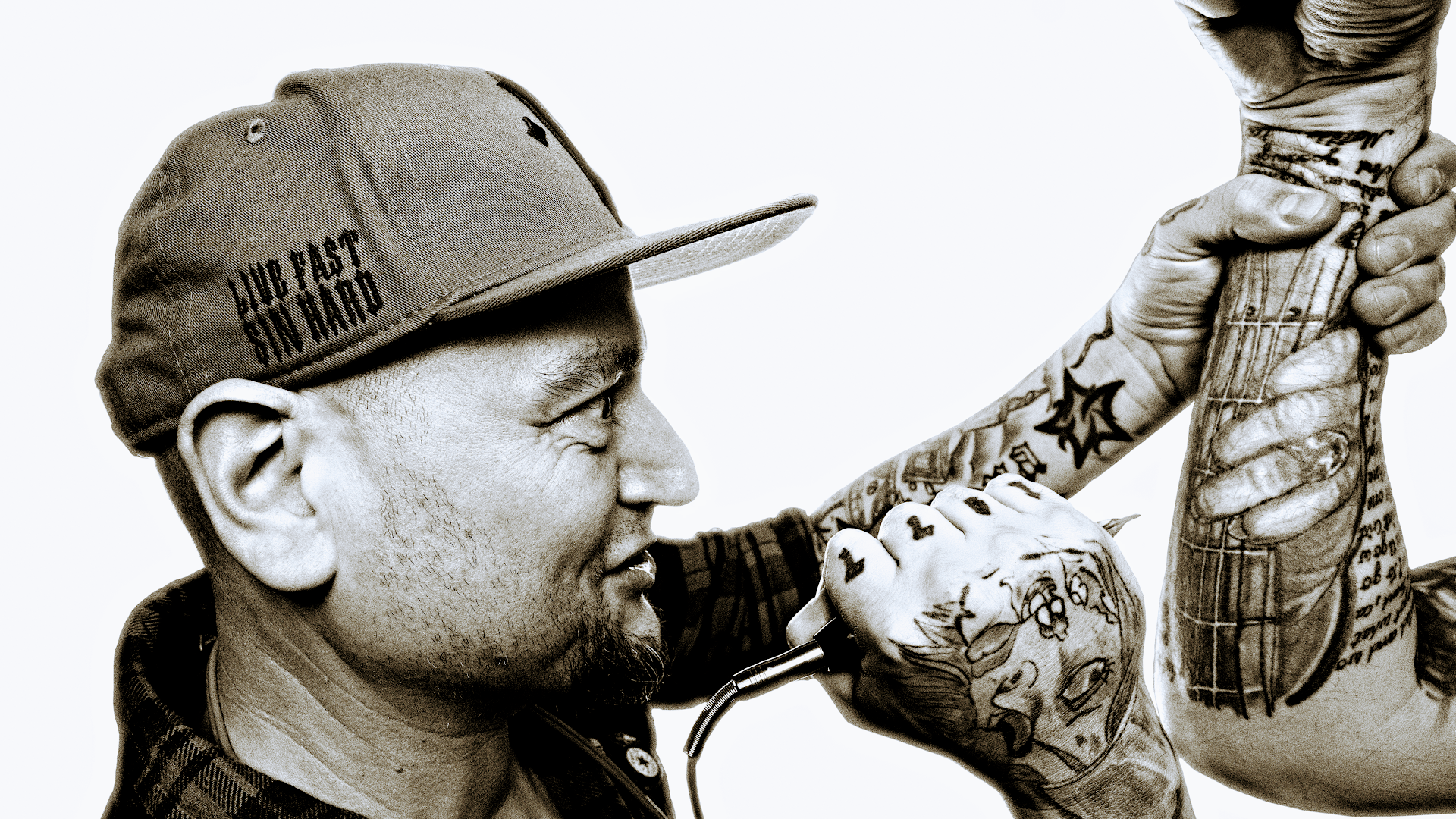 a man with portrait tattooss on his arm and arm, neuburg-schrobenhausen, germany