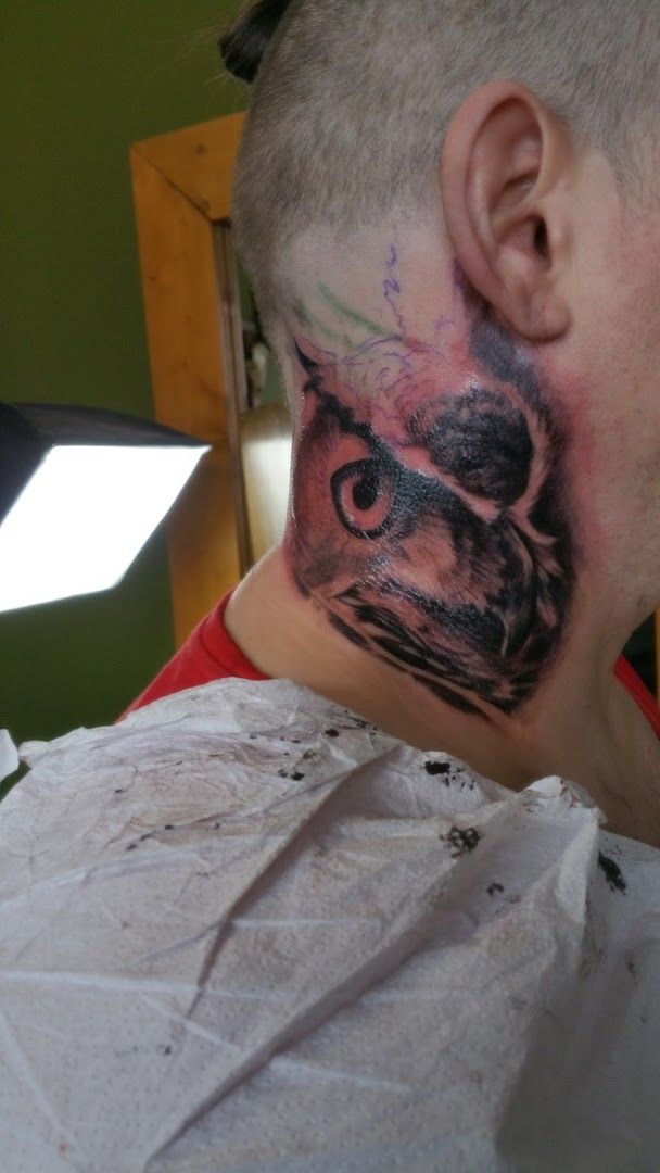 a man with a narben tattoo on his neck, kassel, germany