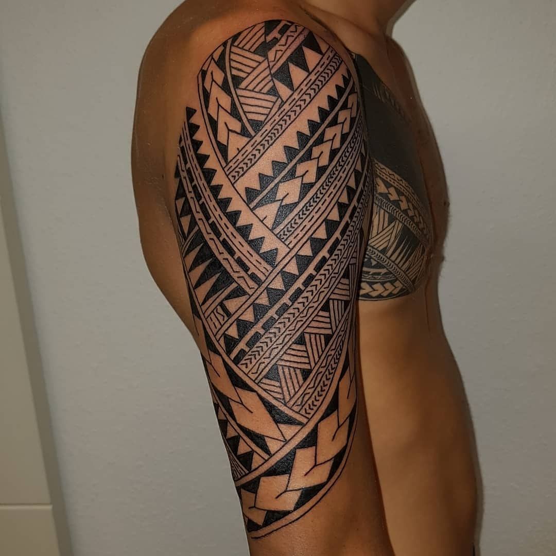 a man with a tribal japanische tattoos in leipzig on his arm, mönchengladbach, germany