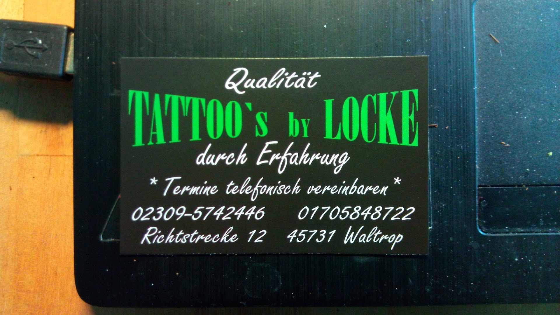 a black and green narben tattoo box with a tattoo sticker on it, recklinghausen, germany