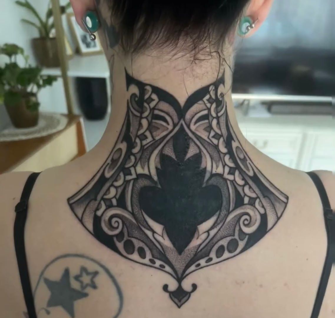 a woman with a black and white cover-up tattoo on her neck, märkisch-oderland, germany