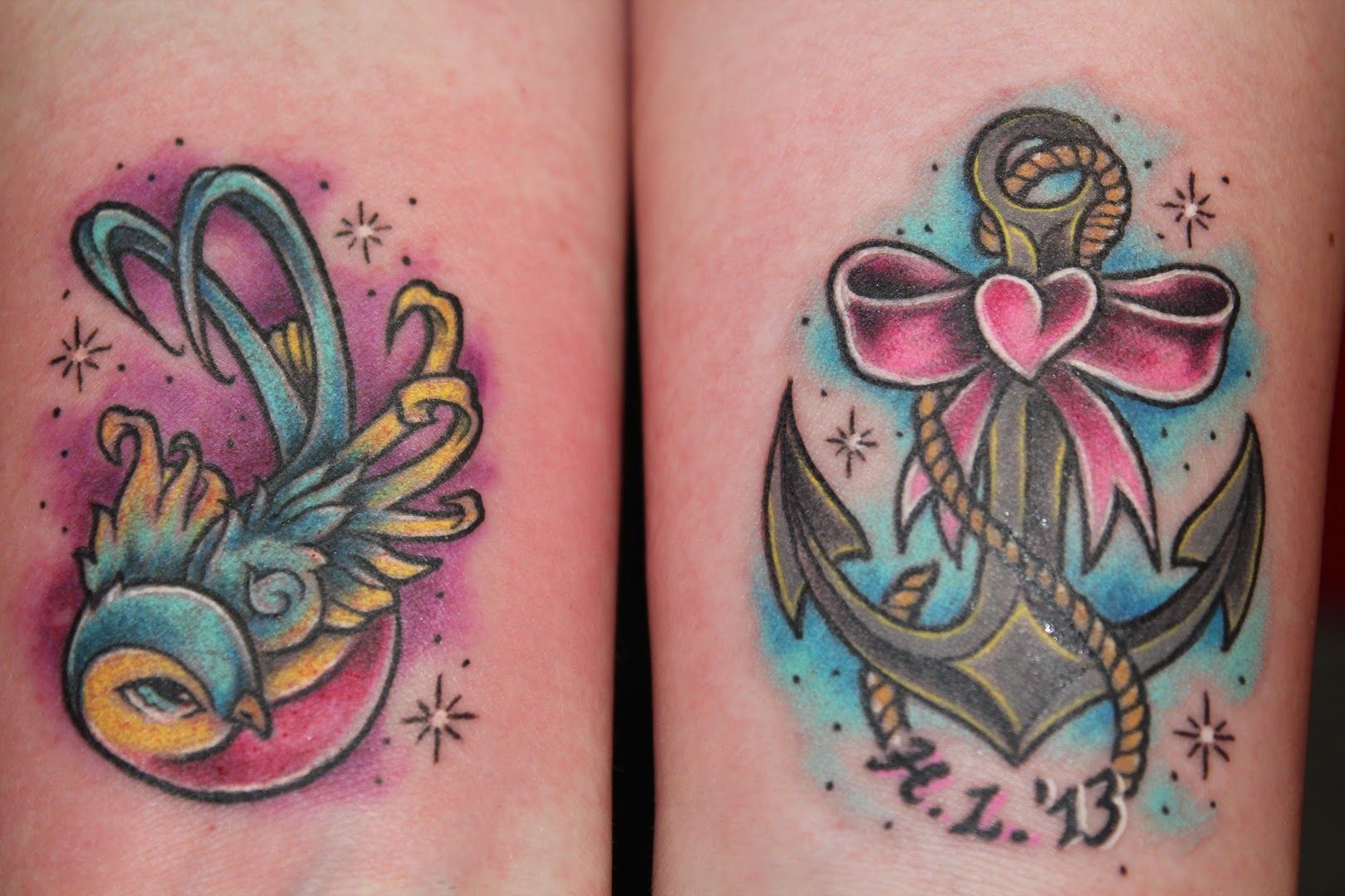 two cover-up tattoos with anchors and a bow, schwerin, germany