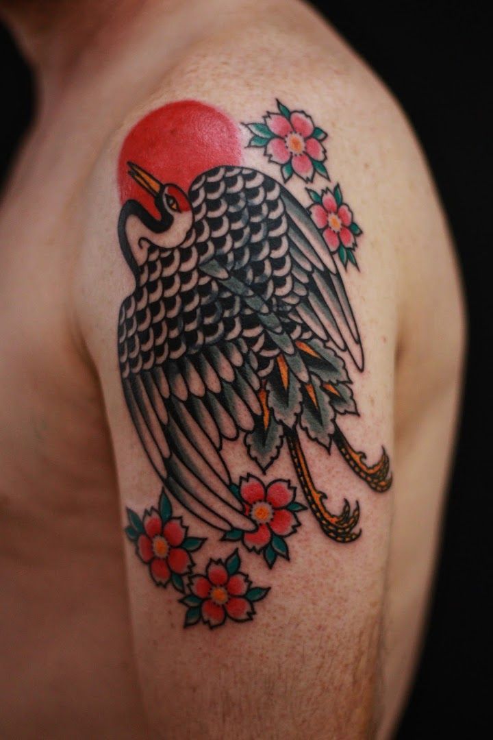 a narben tattoo of an eagle with flowers on its wings, berlin, germany