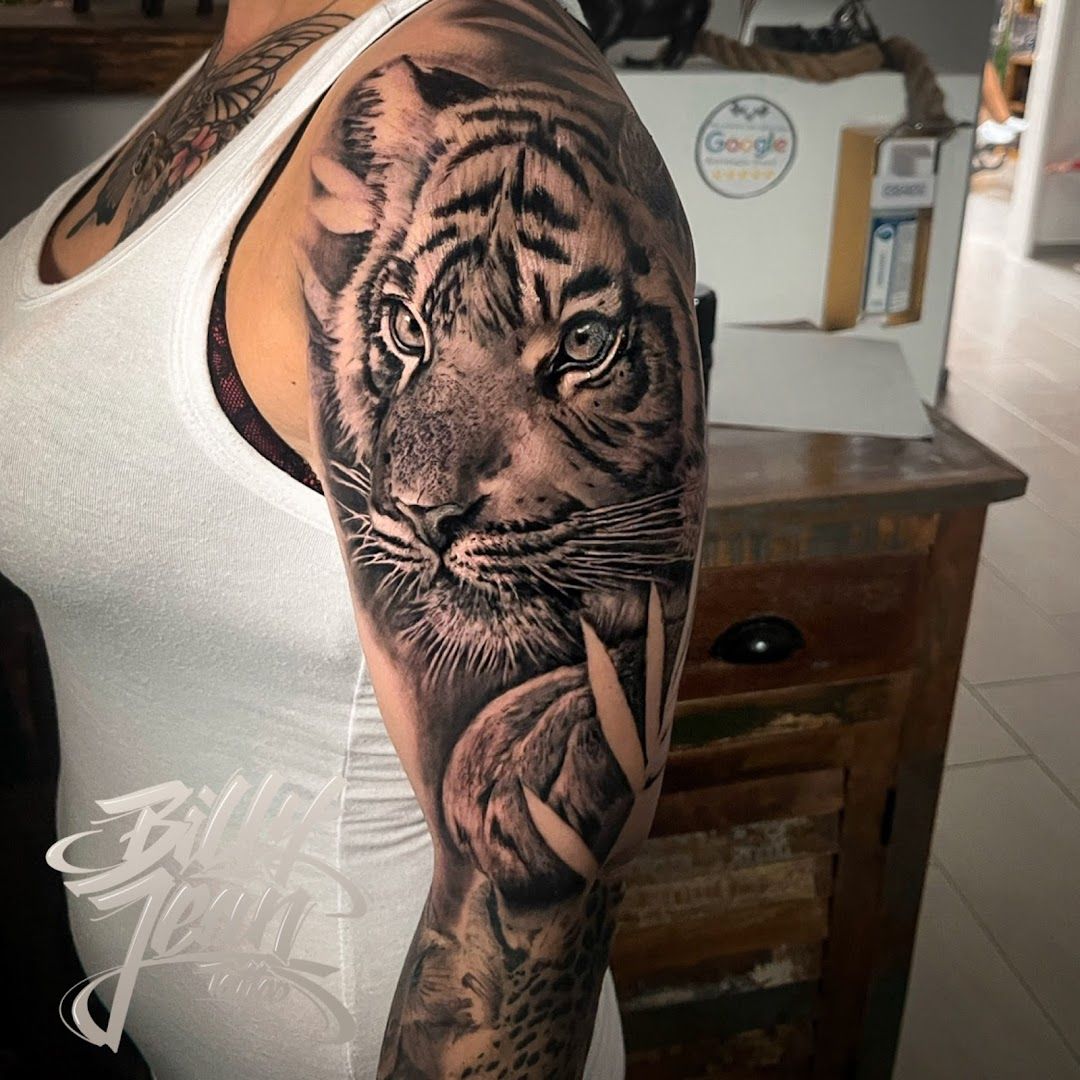 a tiger cover-up tattoo on the arm, berlin, germany