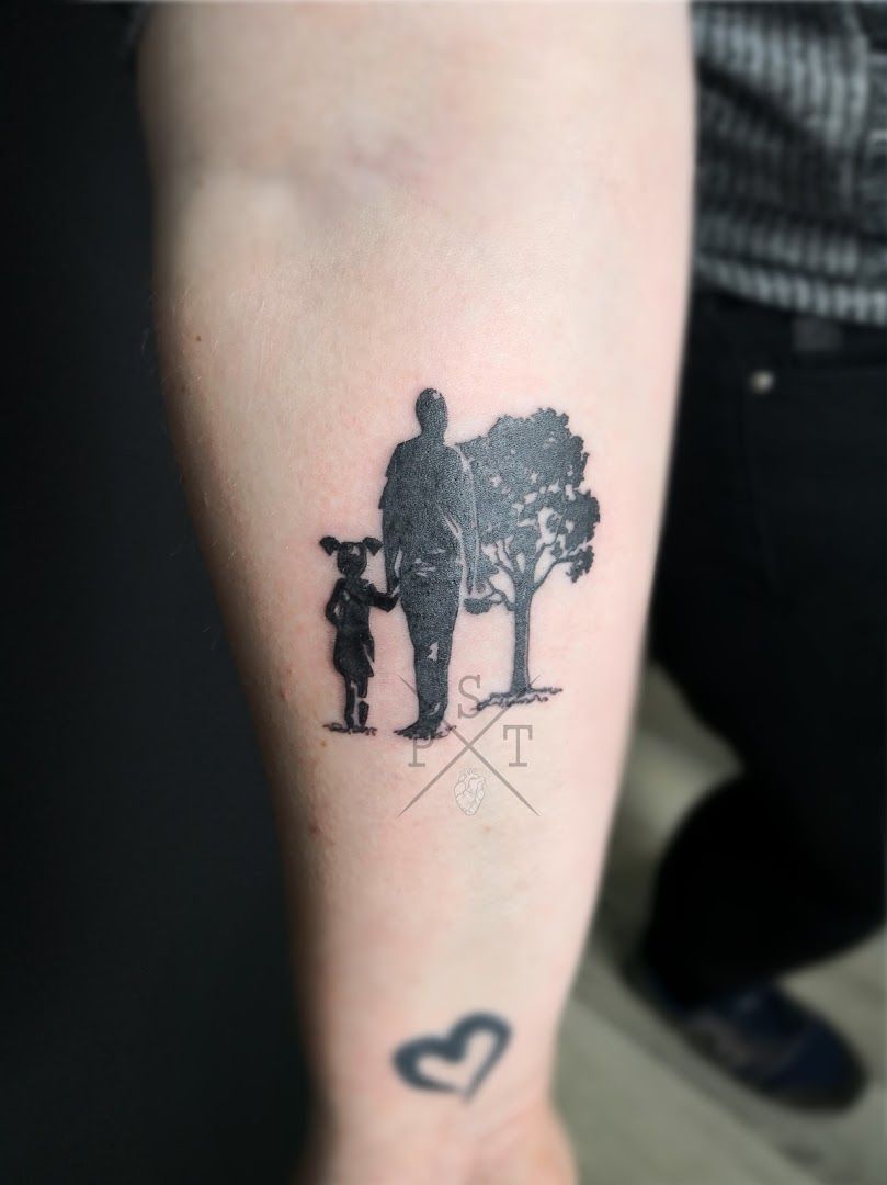 a narben tattoo of a man and woman holding hands, duisburg, germany