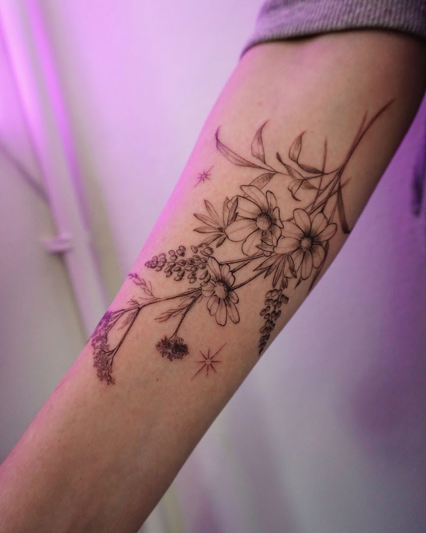 a narben tattoo with flowers on the arm, essen, germany