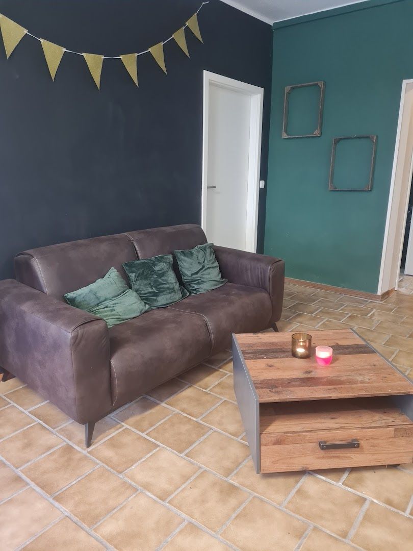 a couch and coffee table in a living room