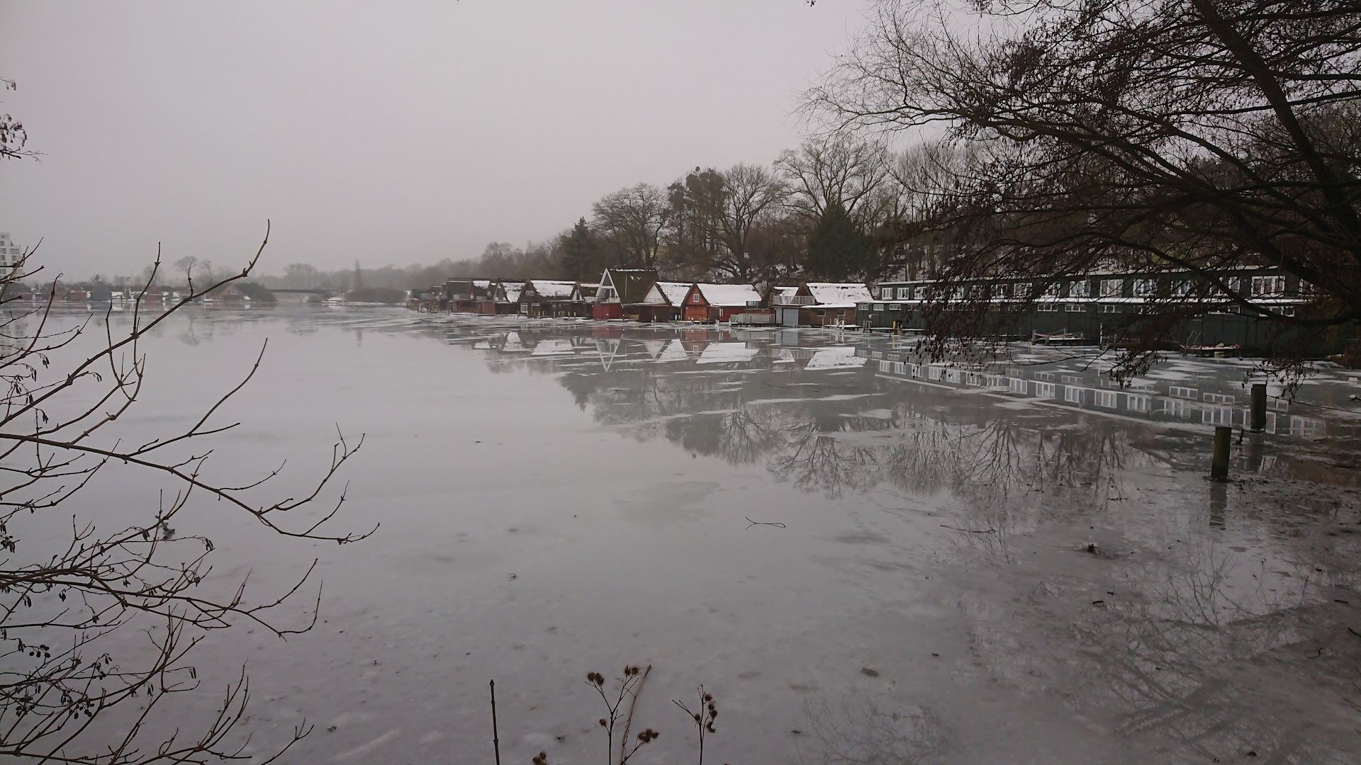 a flooded street in the middle of a town