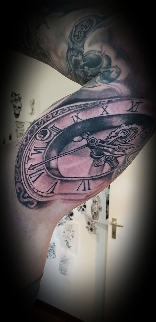 a cover-up tattoo of a whale and a clock, uckermark, germany