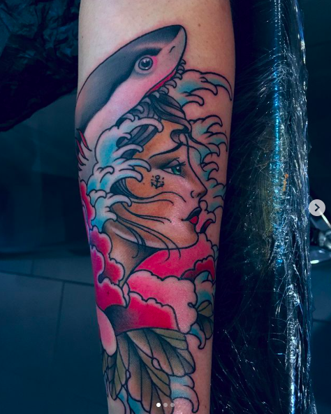 a cover-up tattoo with a shark and flowers, kreisfreie stadt bottrop, germany