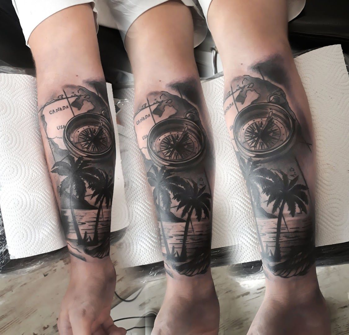 a man with a compass cover-up tattoo on his leg, ennepe-ruhr-kreis, germany