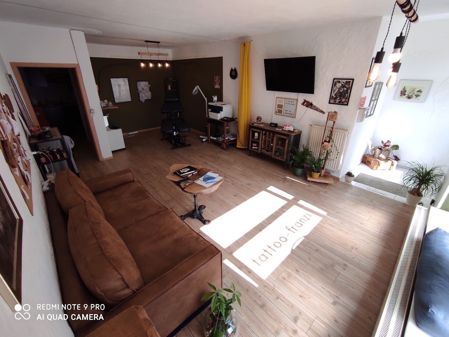 a living room with a couch and a television