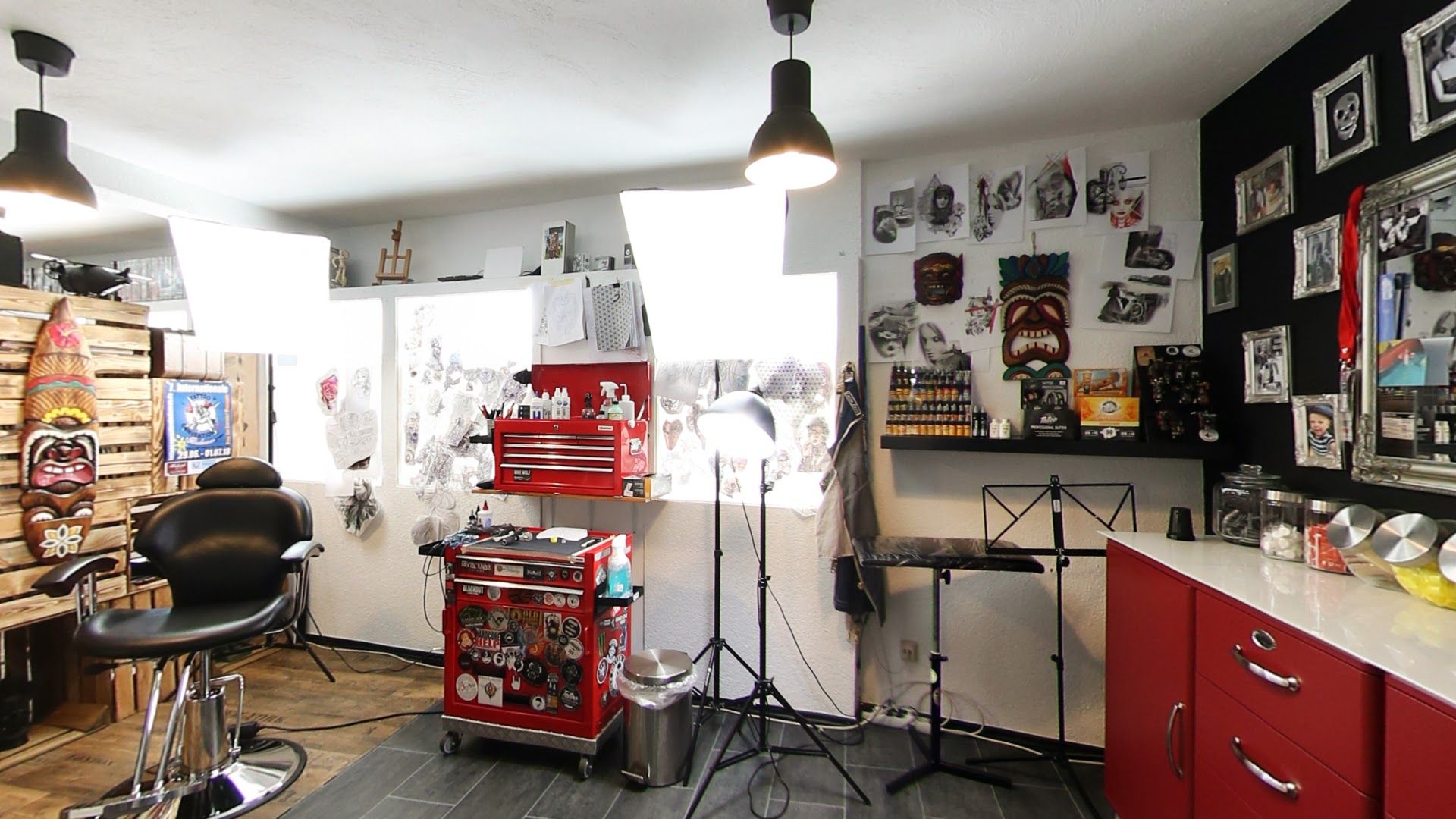 a room with a lot of work equipment