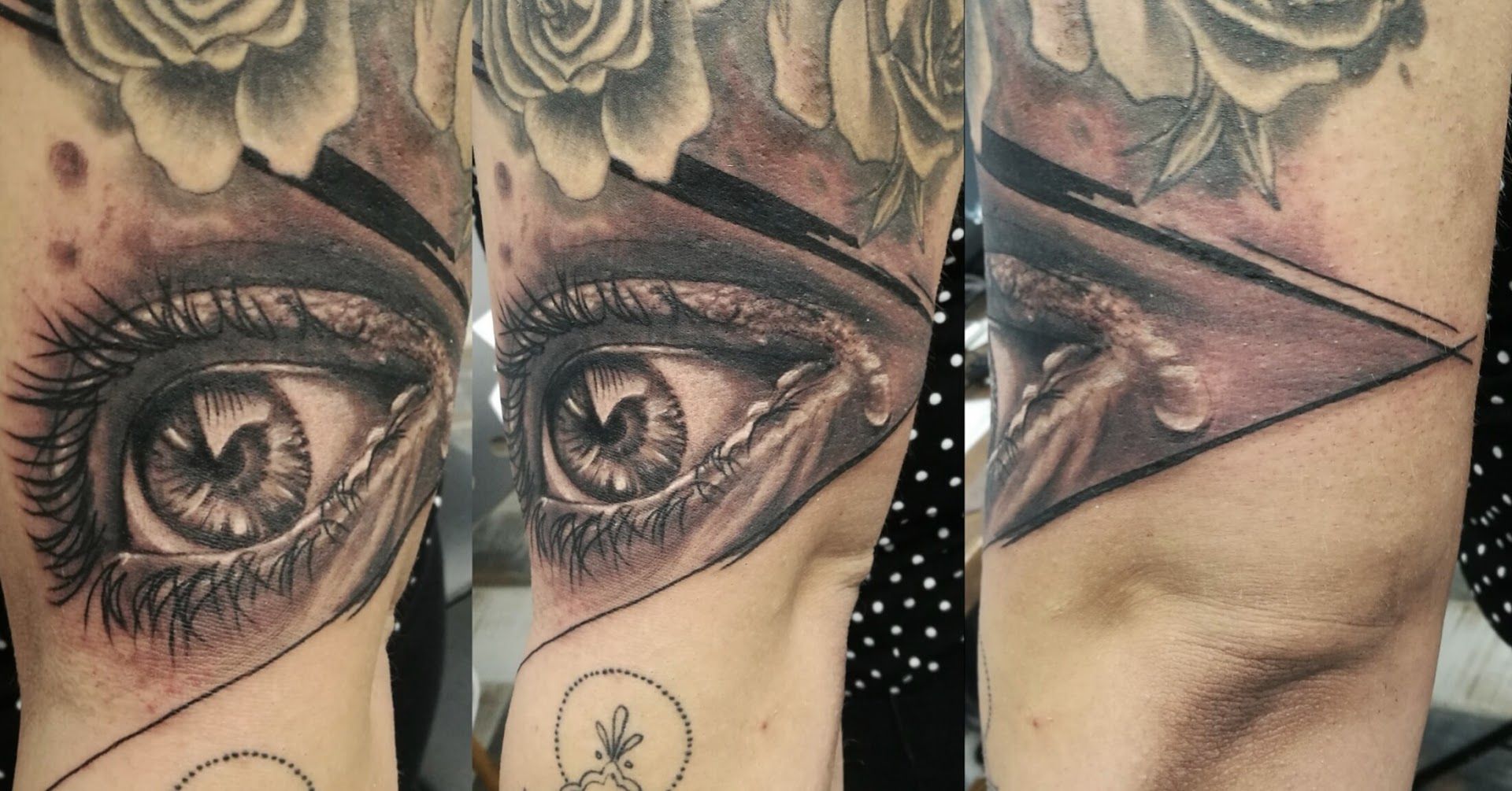 a black and grey cover-up tattoo with a rose and an eye, barnim, germany