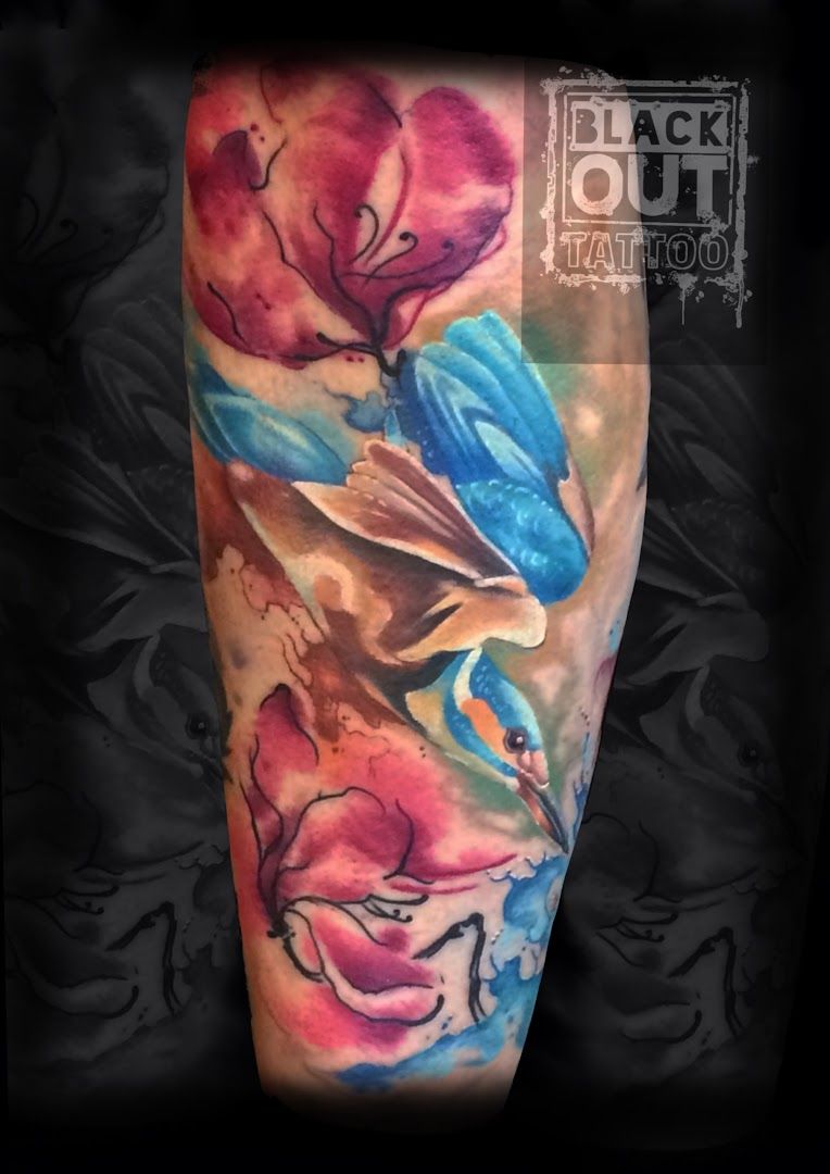 a colorful cover-up tattoo design with flowers, görlitz, germany