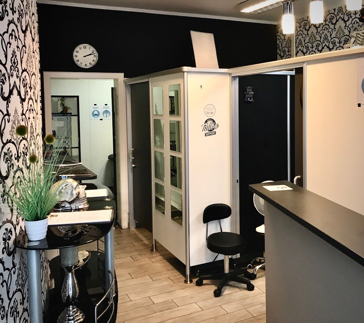 a black and white office with a desk and chair