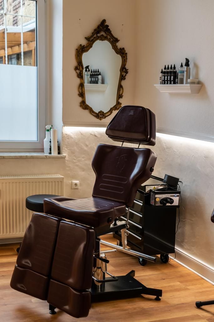 a chair in a room with a mirror