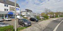 the parking lot at the corner of the street