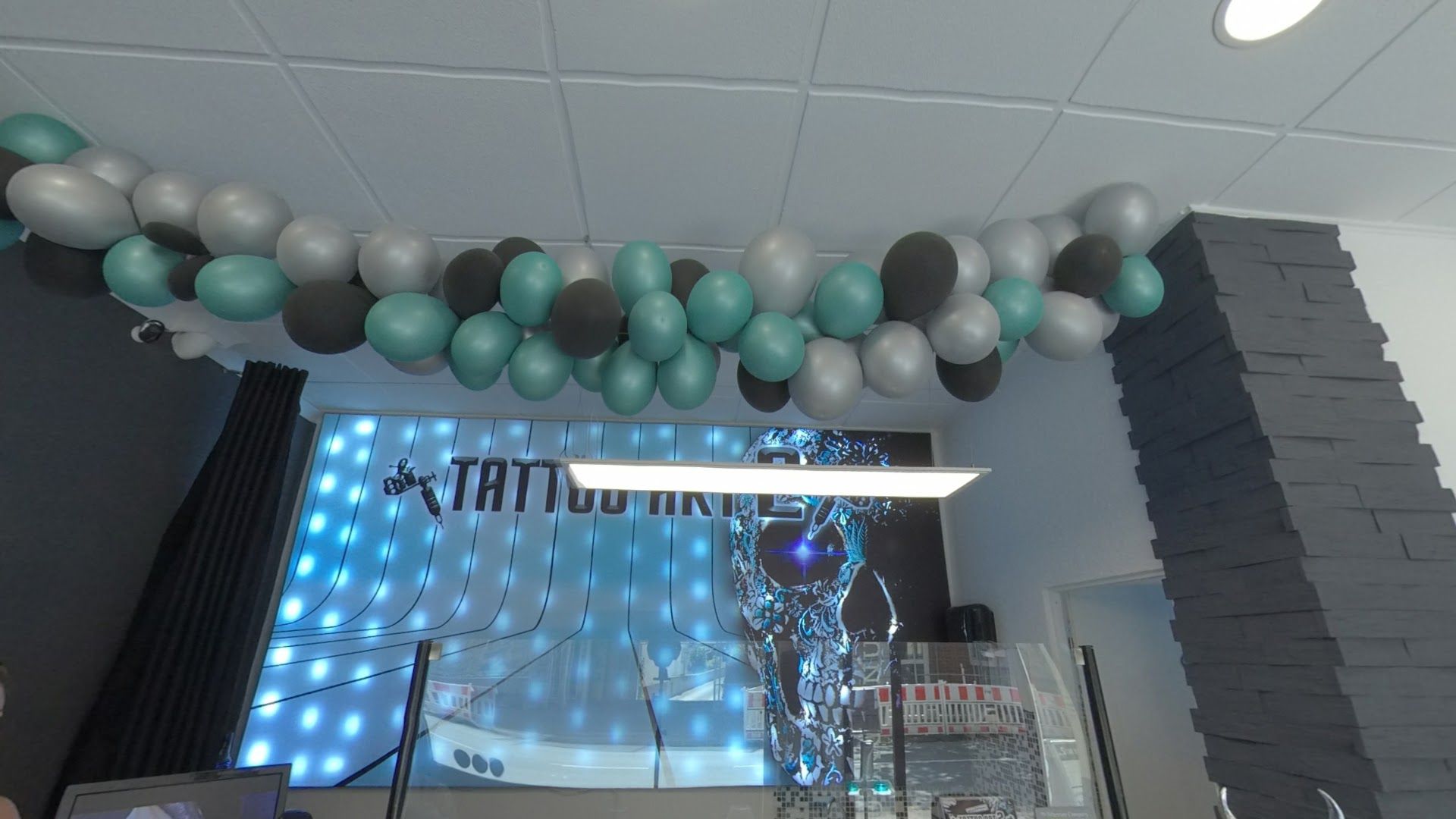 a room with a bunch of balloons and a bunch of balloons
