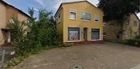 a house with a driveway and a car parked in front