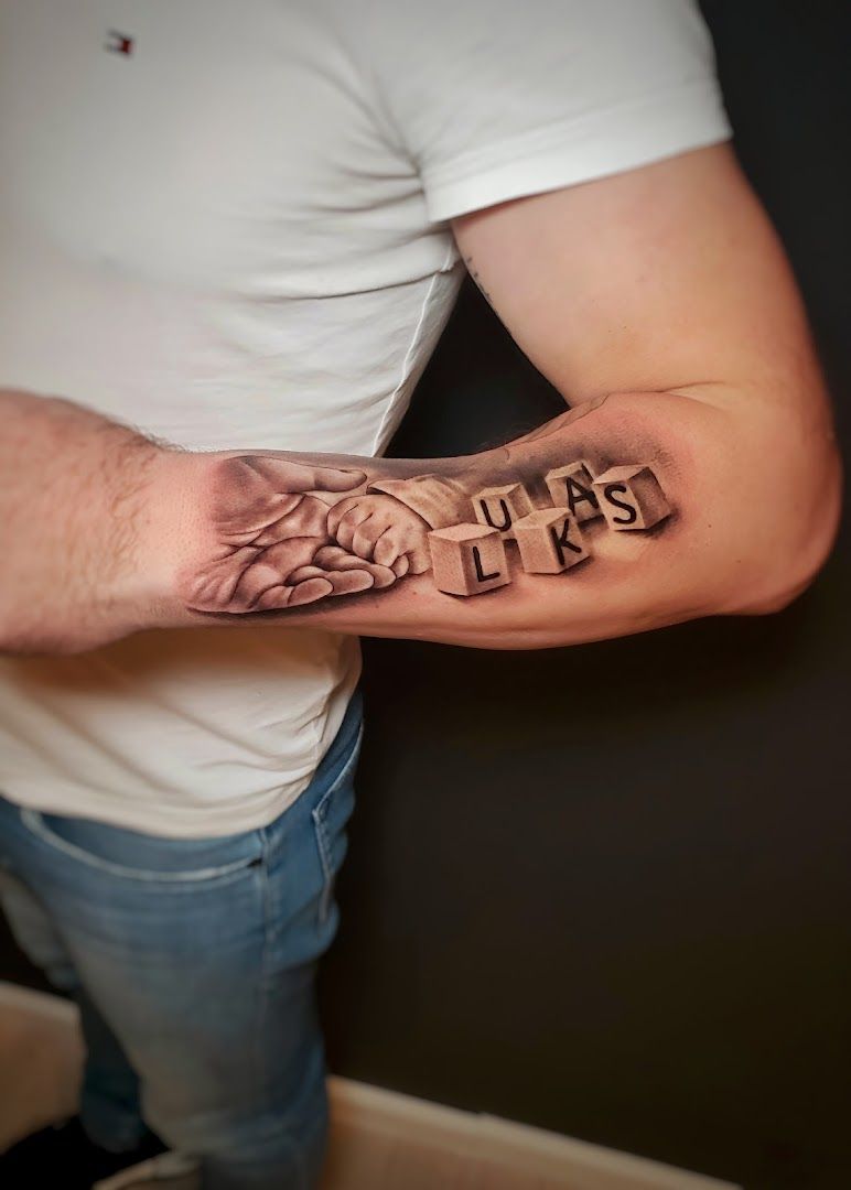 a man with a narben tattoo on his arm, dresden, germany