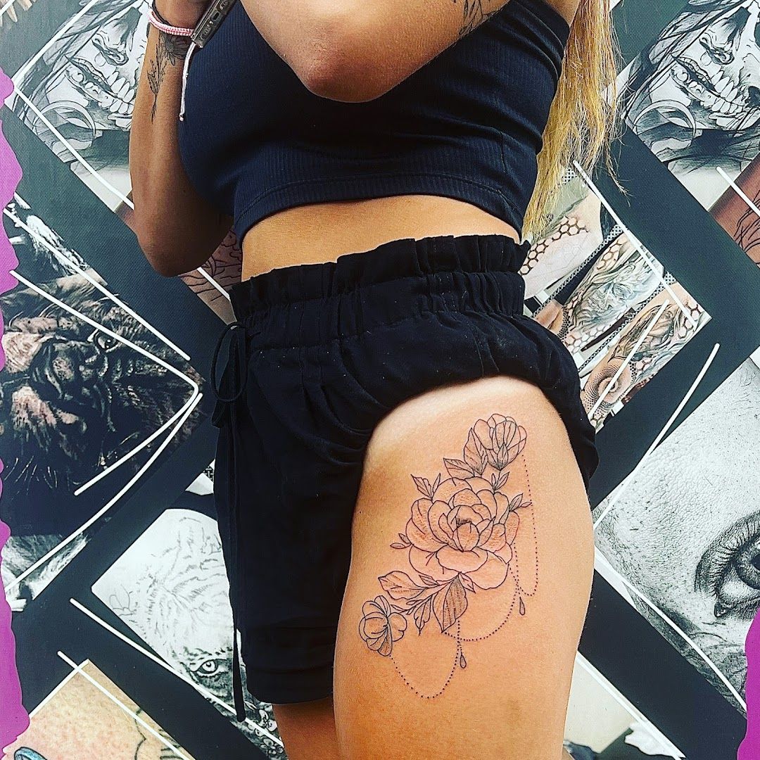 a woman with a narben tattoo on her thigh, siegen-wittgenstein, germany