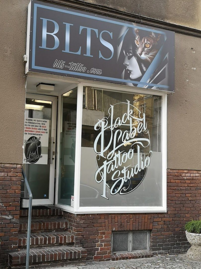 a store front with a sign that says,'the best hair salon '