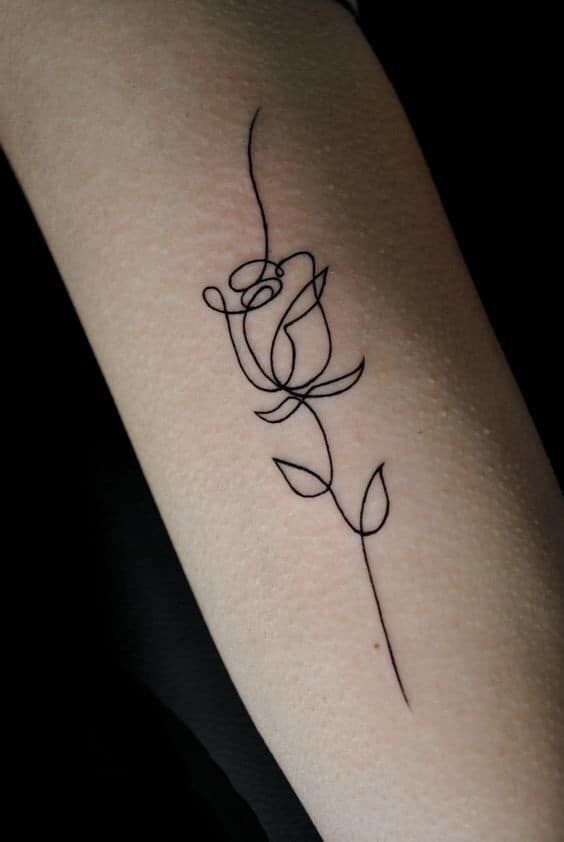 a small narben tattoo of a rose on the wrist, ostallgäu, germany