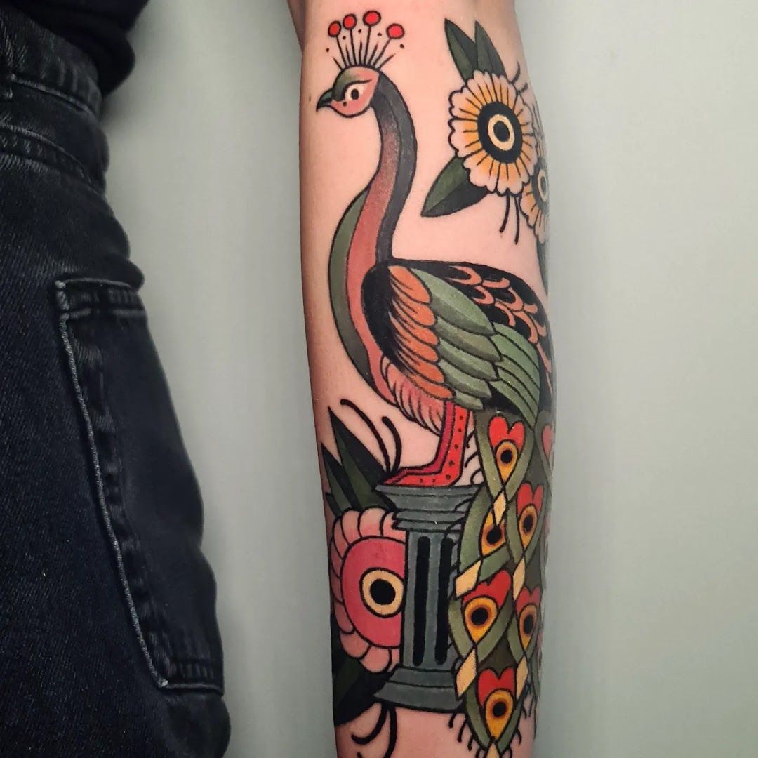 a colorful narben tattoo with a bird and flowers, berlin, germany