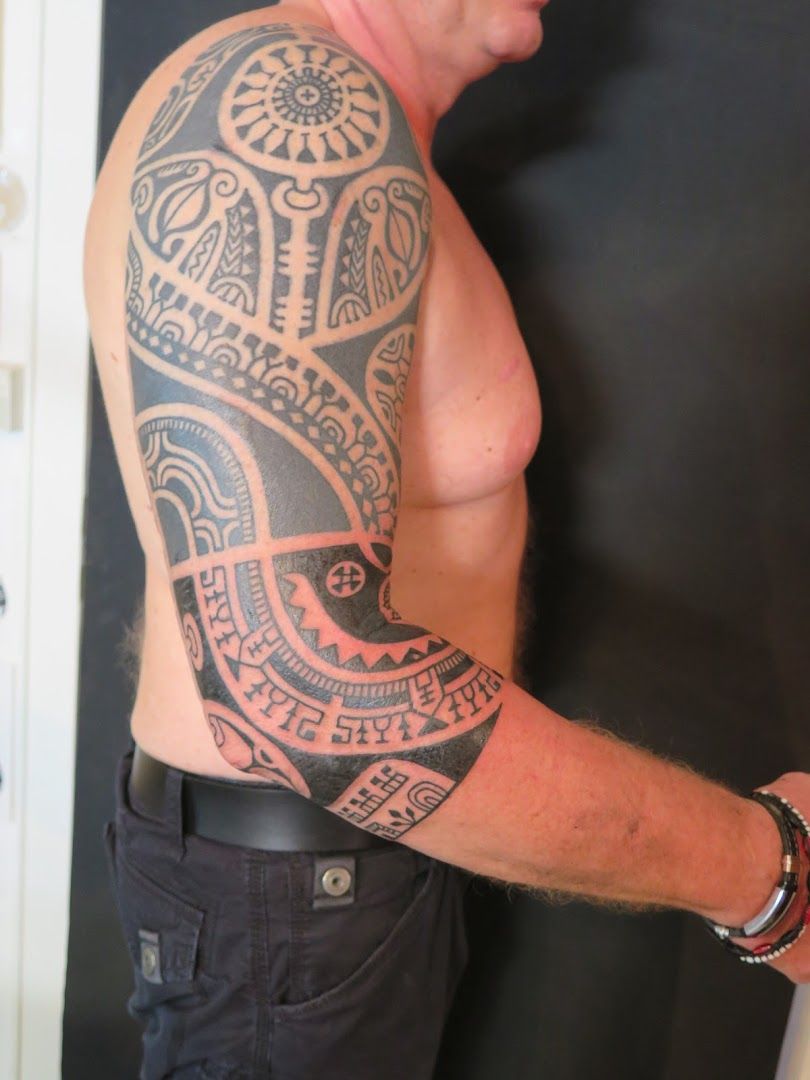 a man with a narben tattoo on his arm, erding, germany