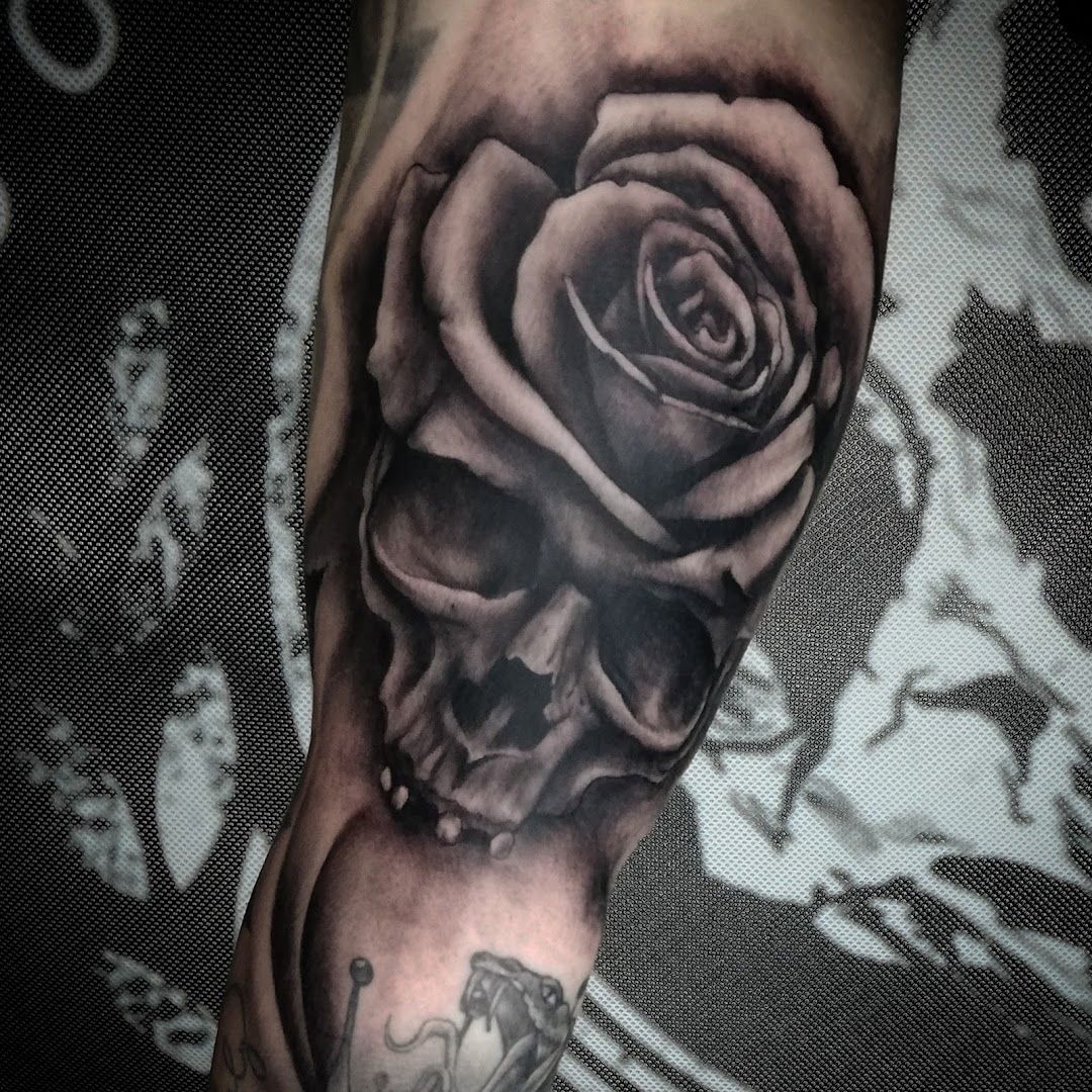 a black and white rose japanische tattoos in leipzig on the arm, main-spessart, germany