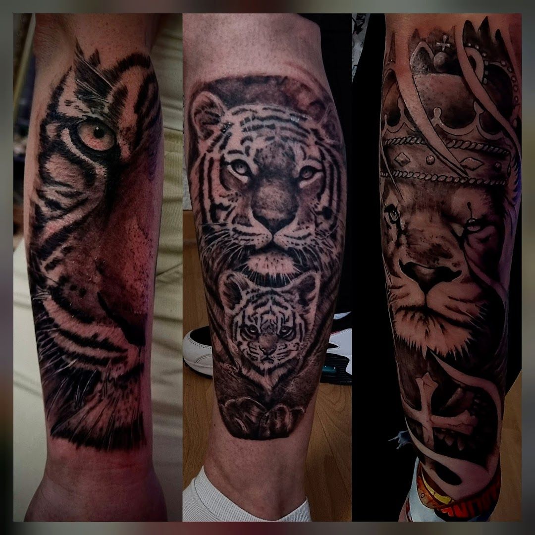 a black and white narben tattoo of a tiger and a tiger, aurich, germany