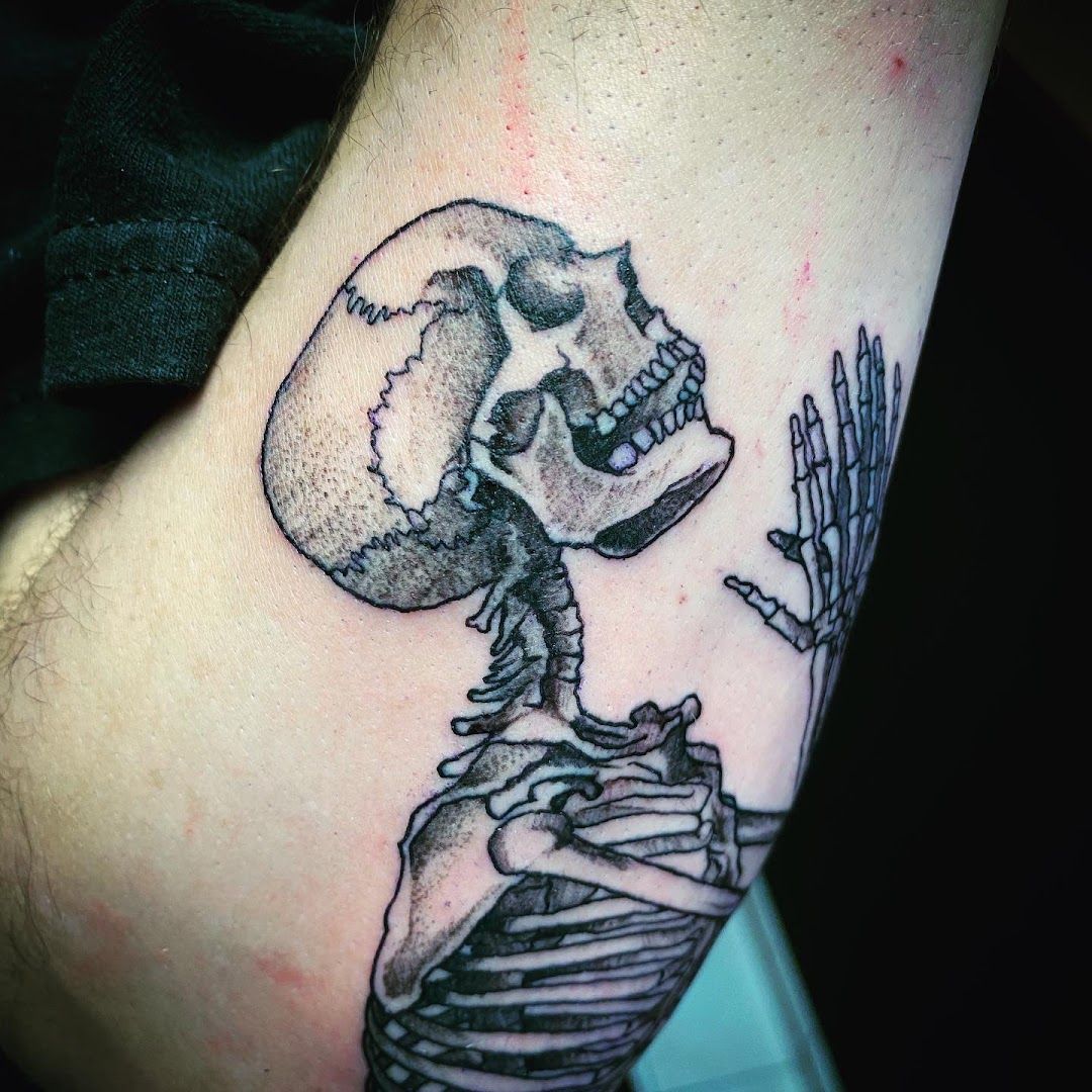 a narben tattoo of a skeleton holding a knife, hohenlohe, germany