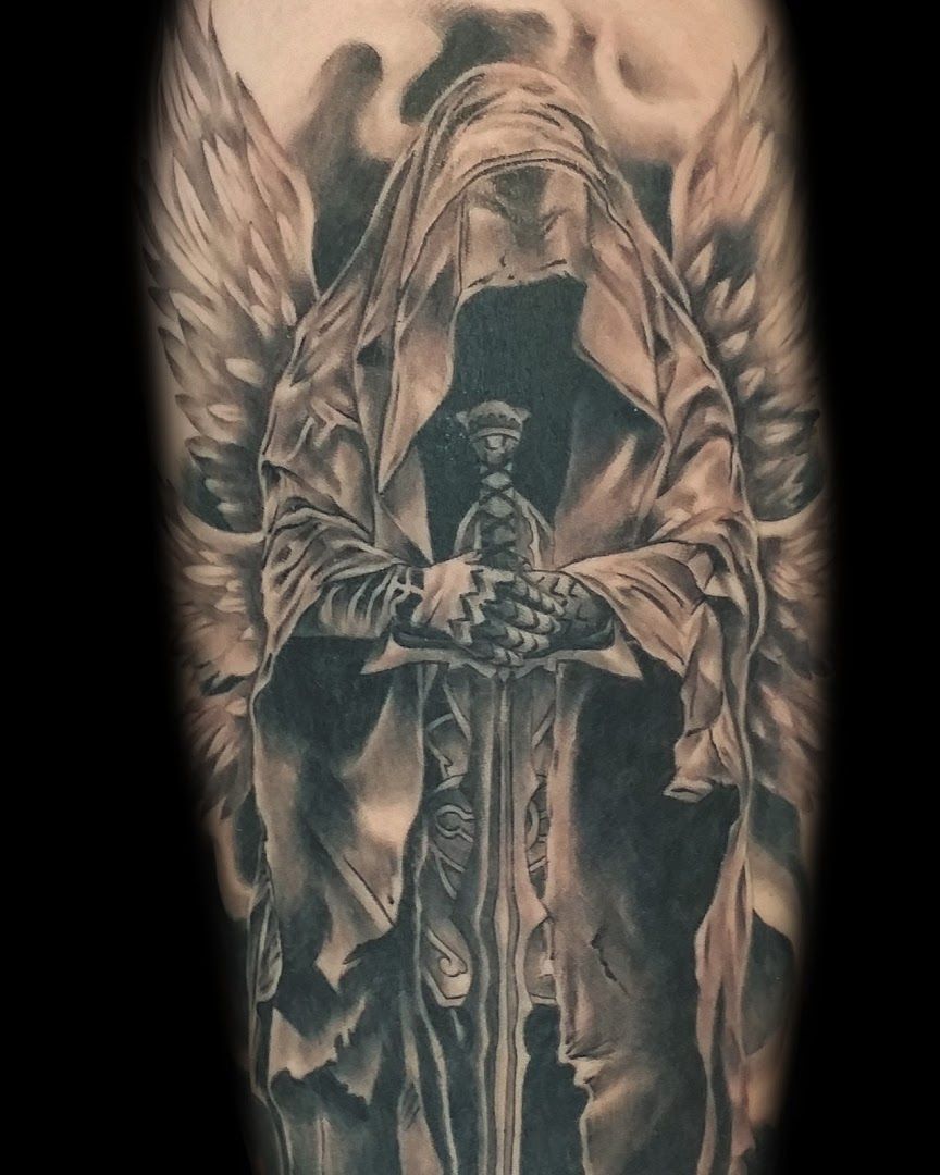 a black and grey portrait tattoos of an angel holding a cross, barnim, germany