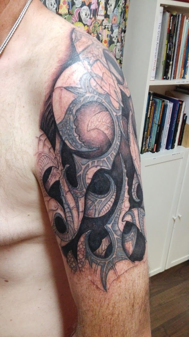 a man with a cover-up tattoo on his arm, aschaffenburg, germany