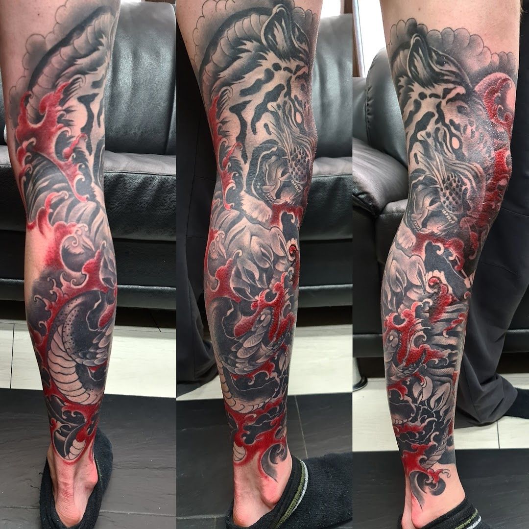 a man with a japanische tattoos in leipzig on his leg, mittelsachsen, germany