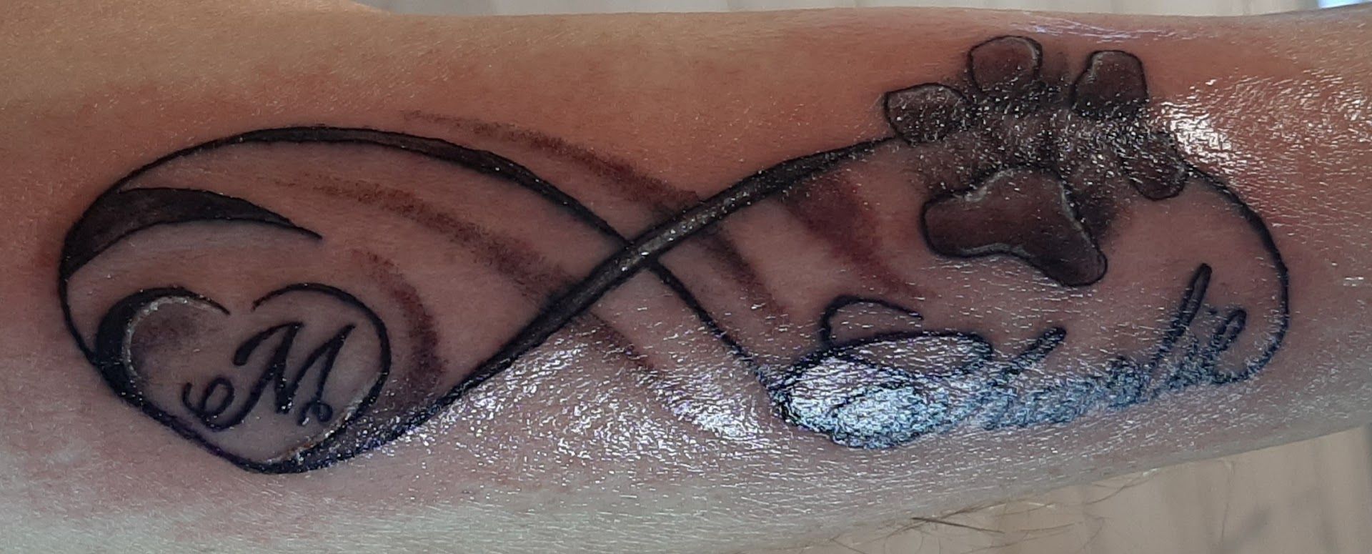 a narben tattoo with a heart and two hearts, kreisfreie stadt bottrop, germany