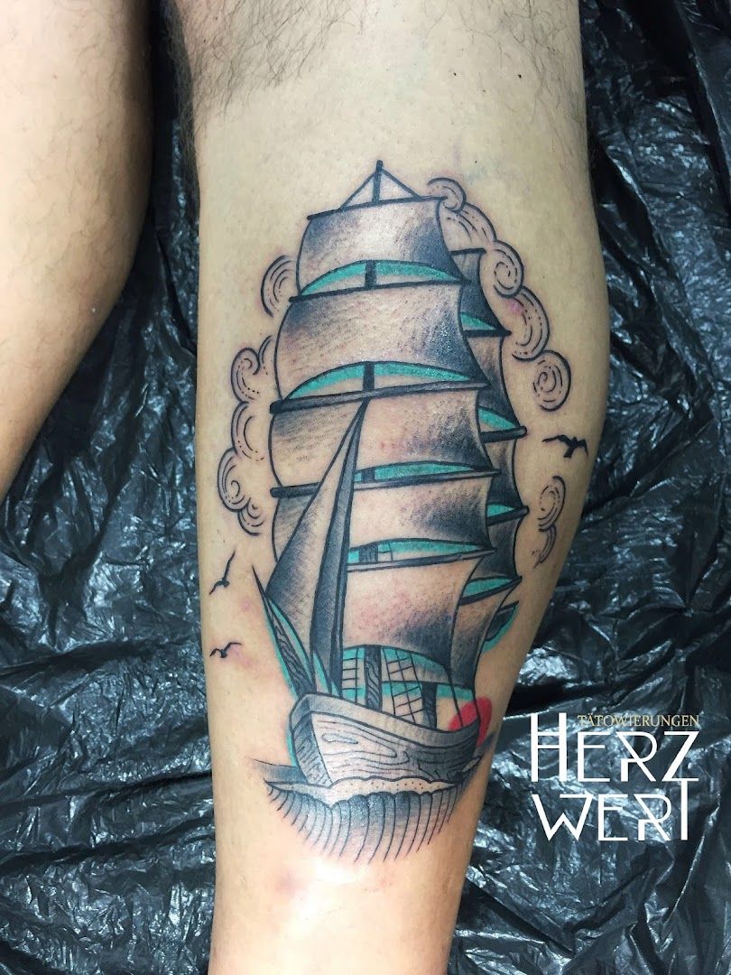 a narben tattoo of a ship on the leg, aachen, germany