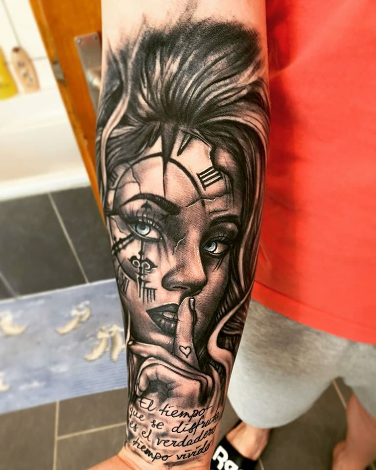a japanische tattoos in leipzig of a woman with a clock on her arm, bonn, germany