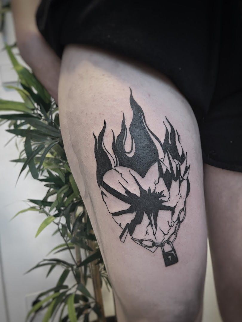 a cover-up tattoo of a black and white pokemon, berlin, germany