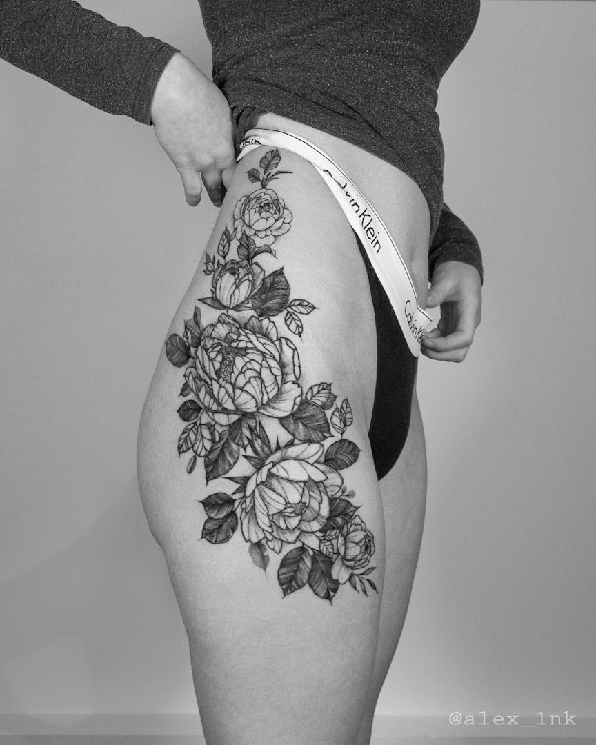 a woman with a cover-up tattoo on her thigh, ahrweiler, germany