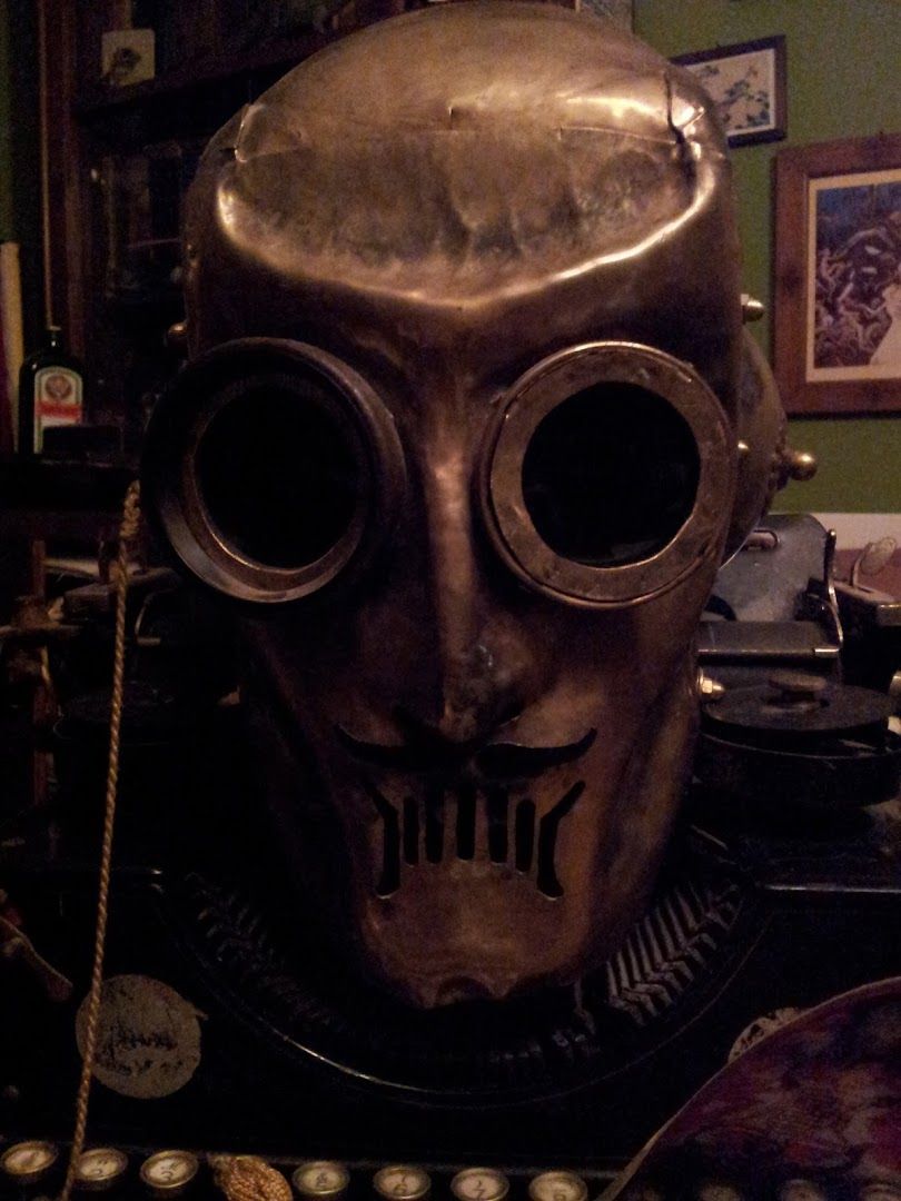 a skull mask on display in a museum