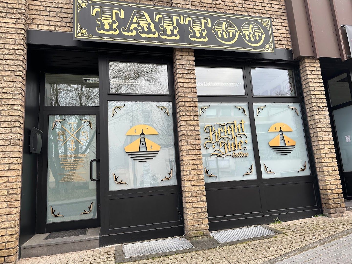 a building with a sign that says the entrance to the restaurant