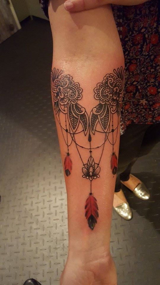 a cover-up tattoo design on the leg, mönchengladbach, germany