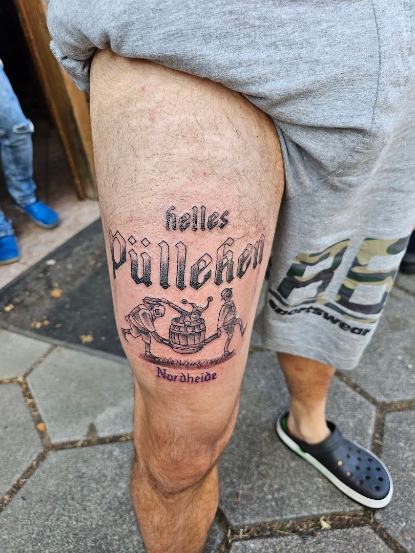 a man with a narben tattoo on his leg, county of bentheim, germany