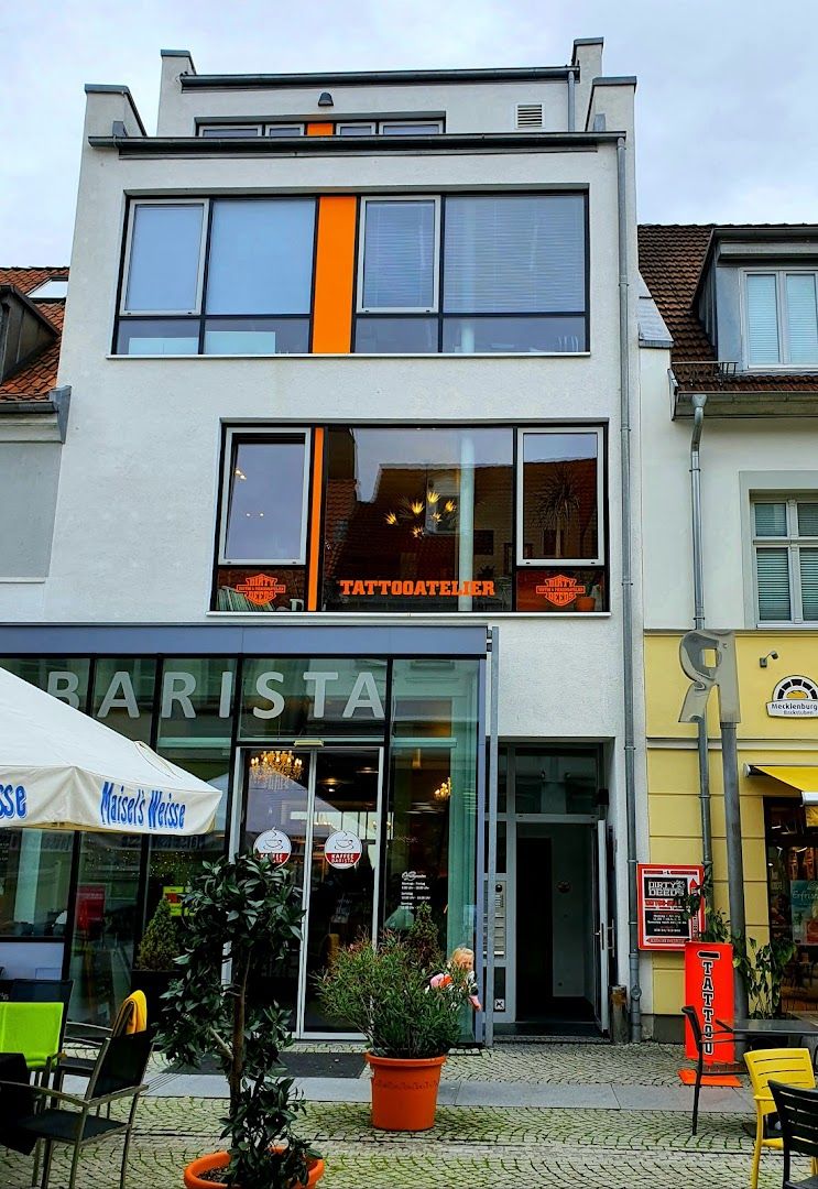 a building with a sign that says cafe