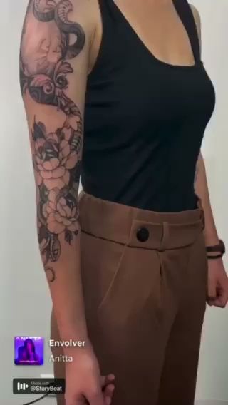 a woman with a blackwork tattoo on her arm, nürnberg, germany