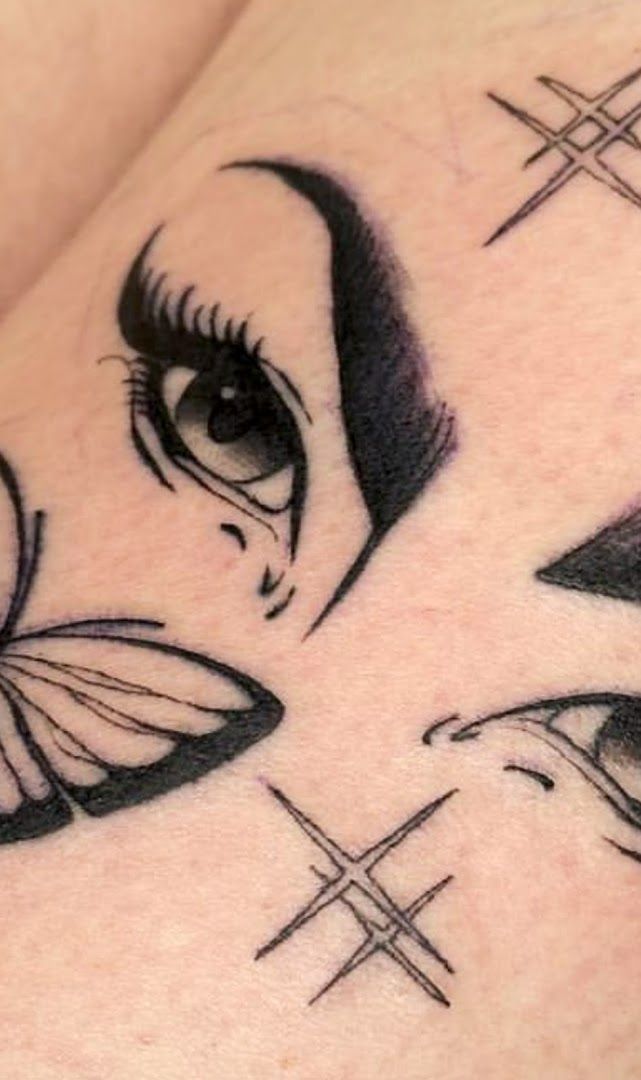 a cover-up tattoo with a woman's face and cross, berlin, germany